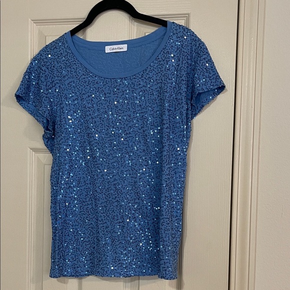 Too Calvin Klein Sparkling Blue Short Sleeve Top. Med elevate your look. - Picture 1 of 3